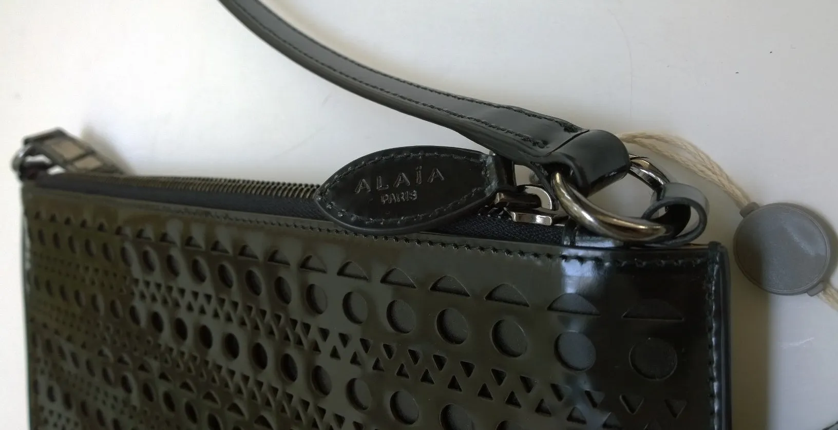 Alaia Black Laser Cut Out Clutch Bag with shoulder strap