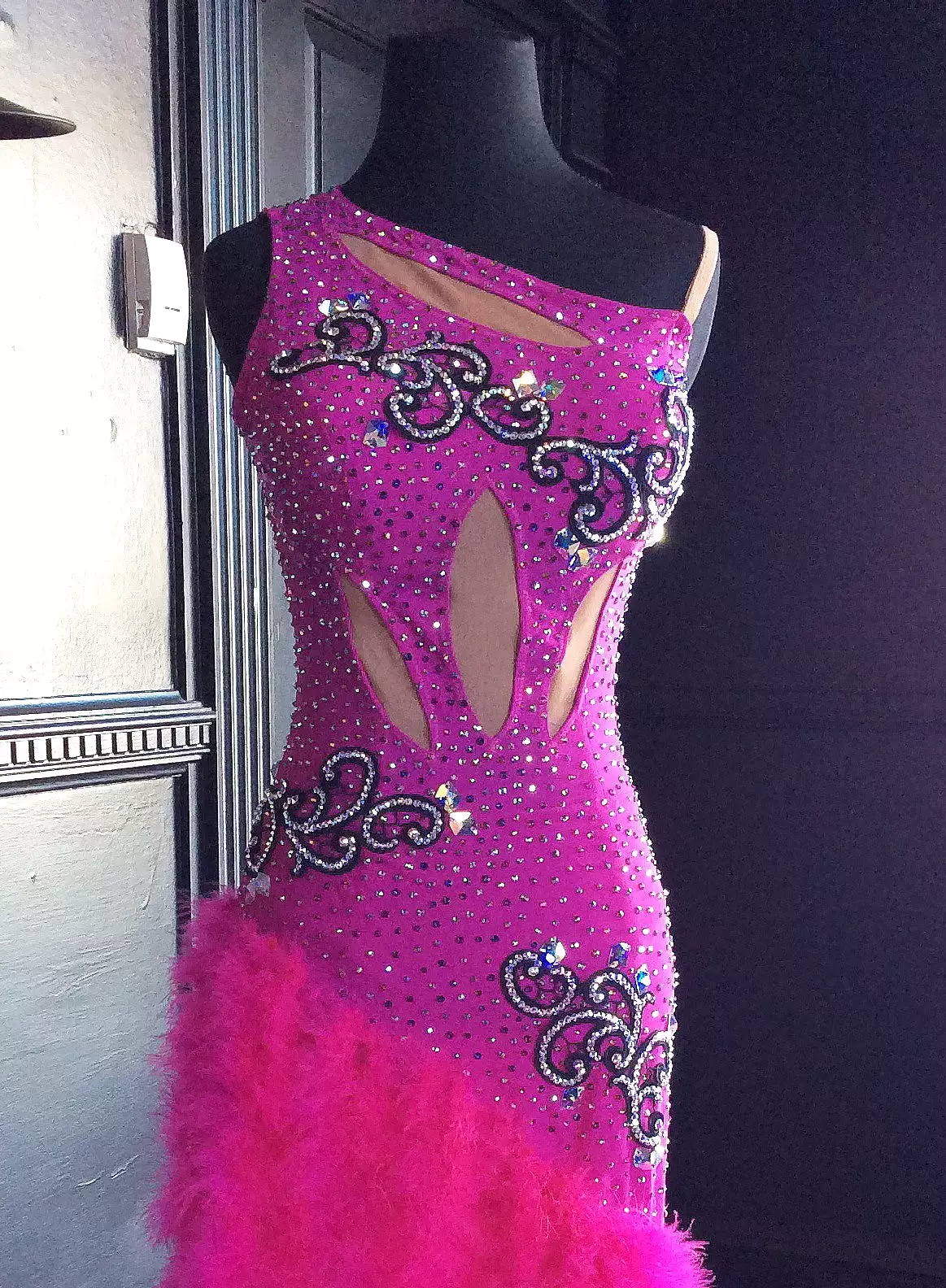 Hot Pink Latin Dress with Black Lace Appliques and Swarovski Stones. Feather skirt and Mesh Cutouts Lat136