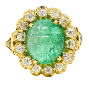 Vintage Egyptian Revival 7.80 CTW Carved Emerald Diamond 18 Karat Yellow Gold Cluster Gemstone Scarab Ring